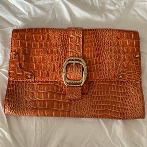 Jessica Simpson tangerine fold-over clutch
